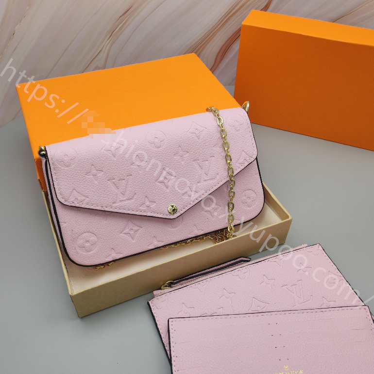 Embossed Monogram Chain Pouch — Pink — source reference photo