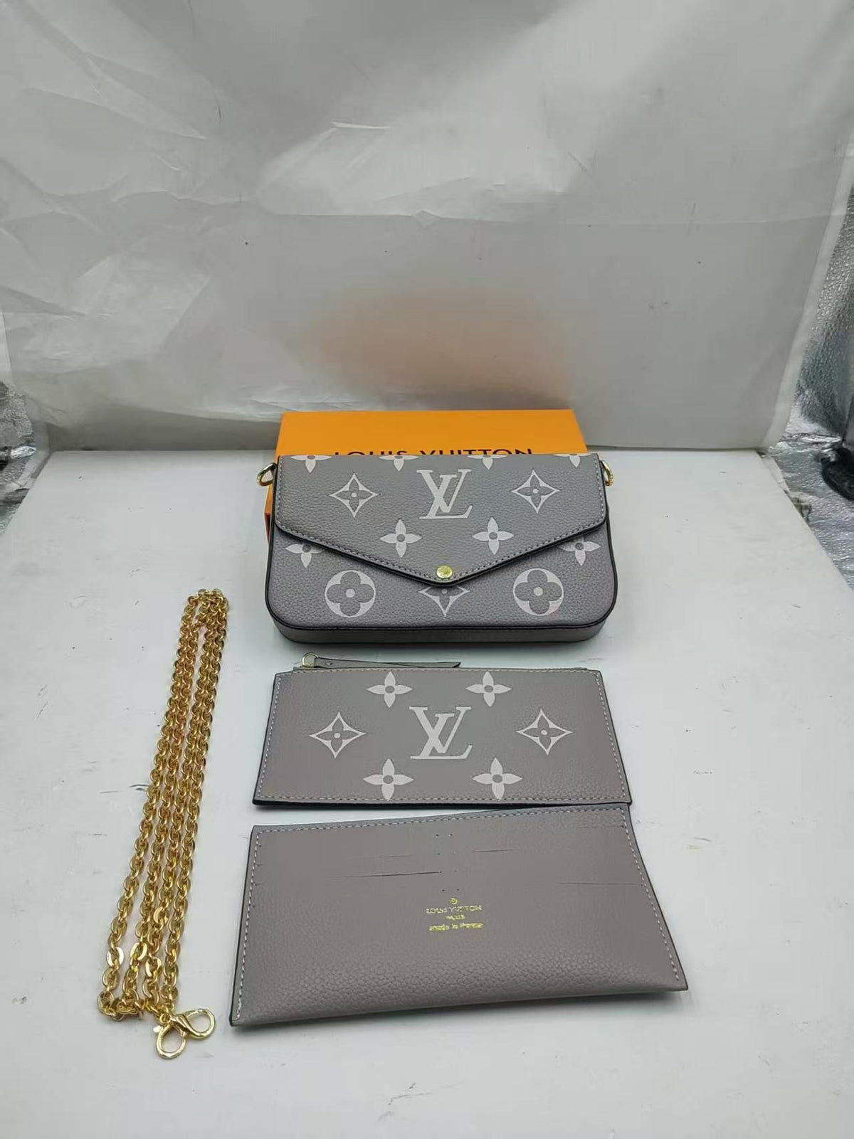 Large Monogram Chain Pouch — Grey / Ivory — source reference photo