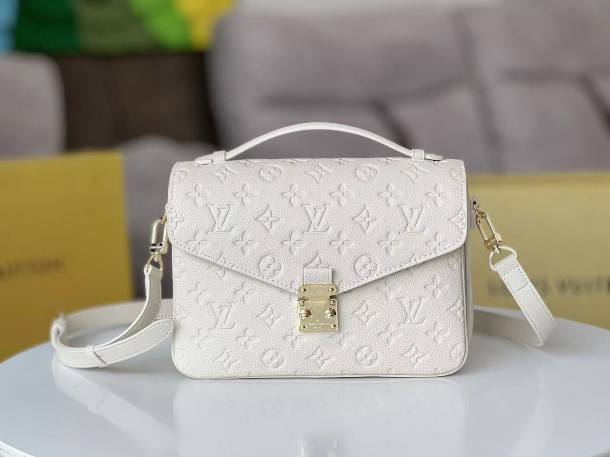 Embossed Monogram Top Handle Crossbody Bag in White, supplier source view
