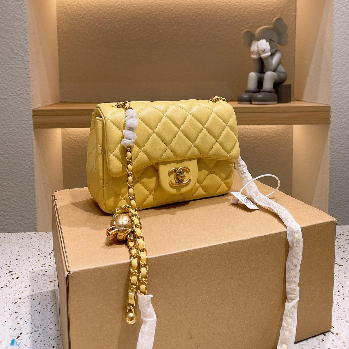 Diamond Quilted Chain Flap Shoulder Bag with Ball Detail in Yellow, supplier source view