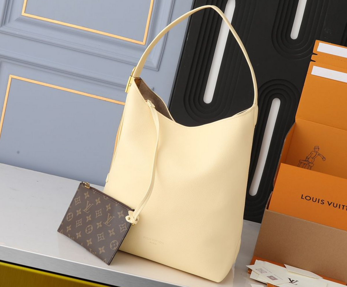 Louis Vuitton Slouchy Hobo Shoulder Bag – Cream Yellow, original supplier catalogue view