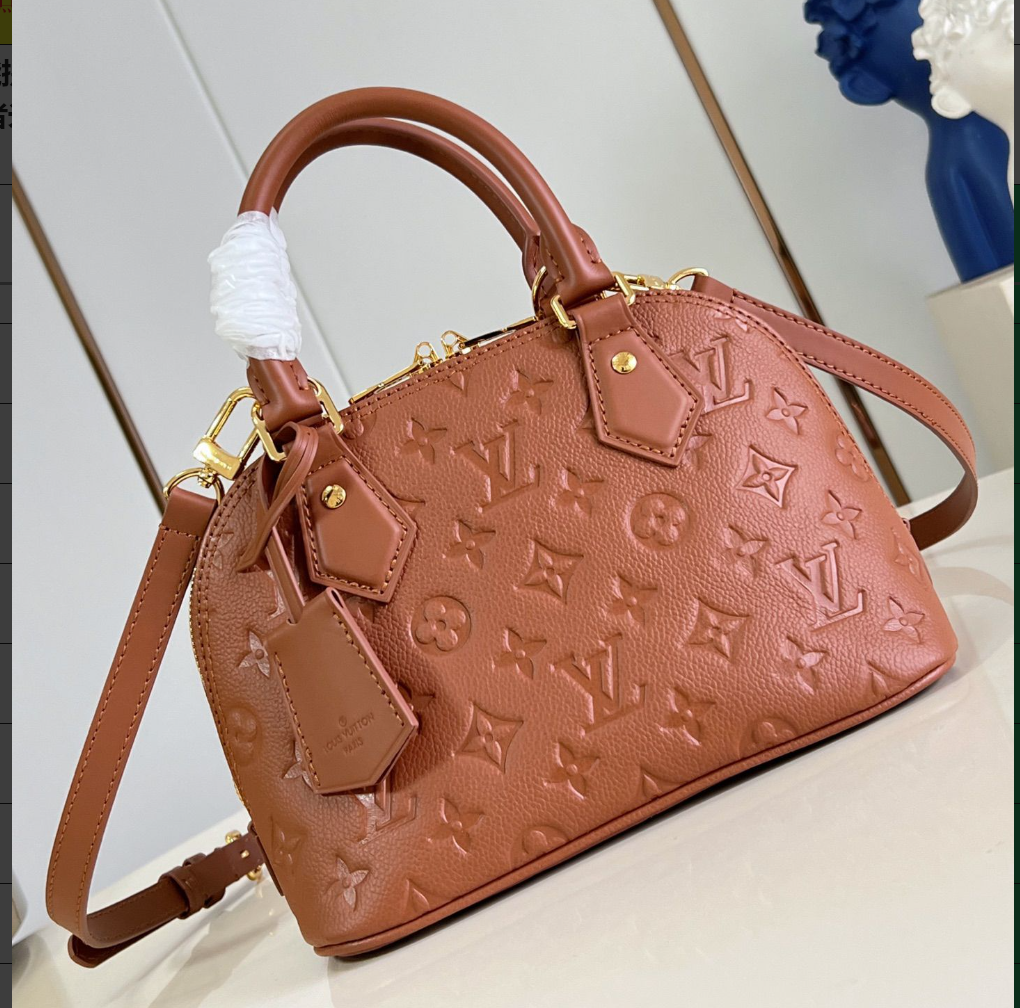 Louis Vuitton Embossed Monogram Top Handle Bag – Cognac Brown, original supplier catalogue view