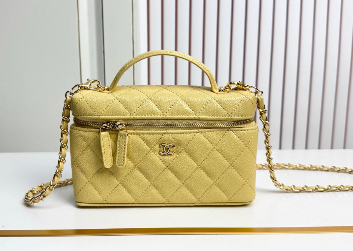 Chanel Diamond Quilted Vanity Bag with Top Handle and Chain – Pale Yellow, original supplier catalogue view