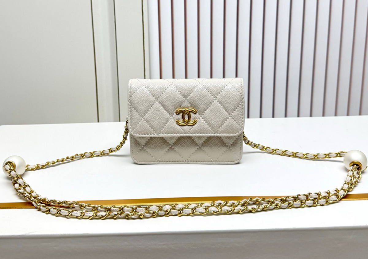 Chanel Diamond Quilted Mini Flap Bag with White-Bead-Detail Chain – Ivory, original supplier catalogue view