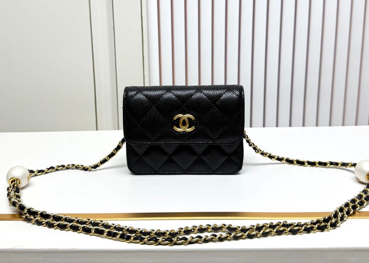 Chanel Diamond Quilted Mini Flap Bag with White-Bead-Detail Chain – Black, original supplier catalogue view
