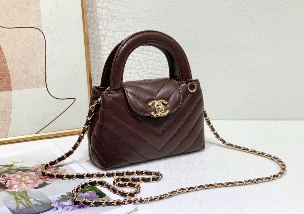 Chanel Chevron Quilted Top Handle Bag – Burgundy, original supplier catalogue view