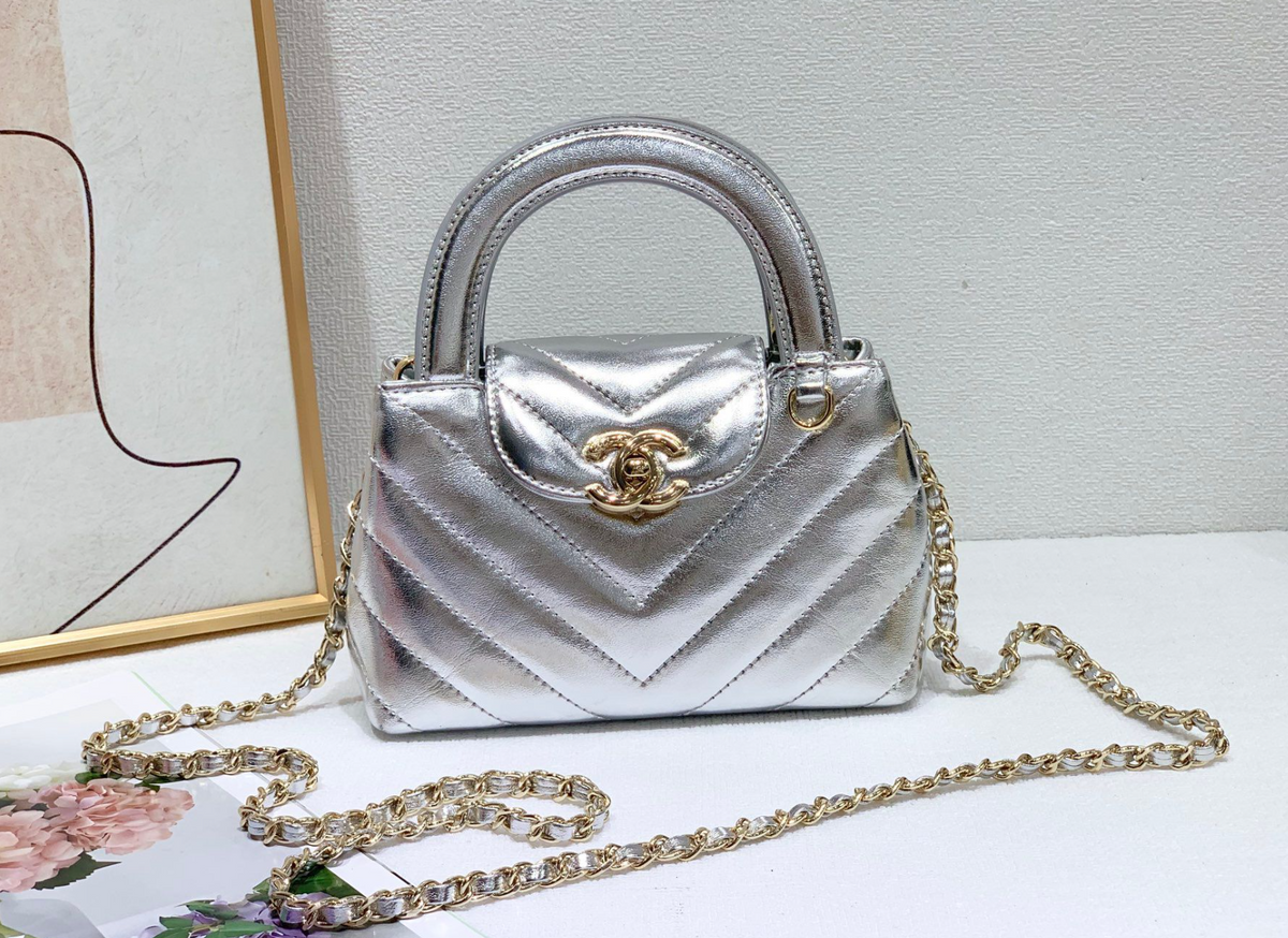 Chanel Chevron Quilted Top Handle Bag – Metallic Silver, original supplier catalogue view