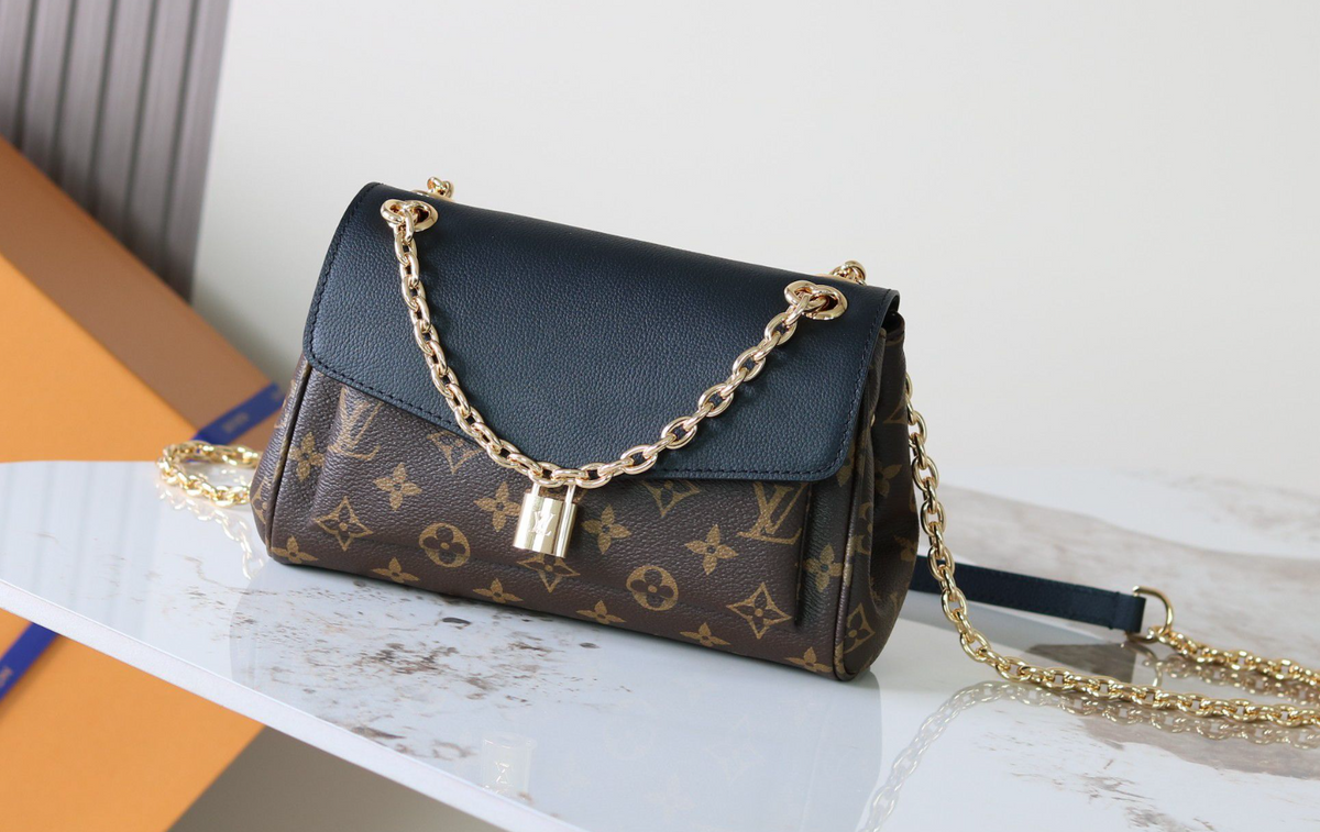 Louis Vuitton Monogram Flap Chain Shoulder Bag – Brown / black flap, original supplier catalogue view