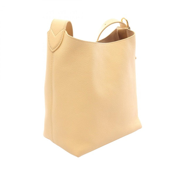 Low Key Hobo PM in beige, rear three-quarter reference view