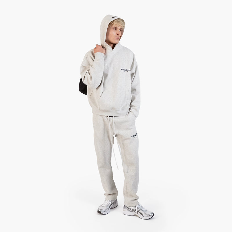 Fear of God Essentials Light Oatmeal Relaxed Sweatpants - model side