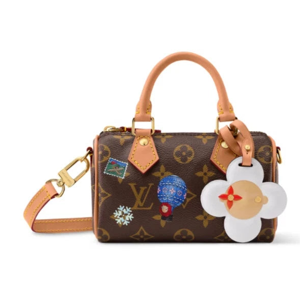 Nano Speedy in Monogram Snowy Pearl, front with white Vivienne charm reference view