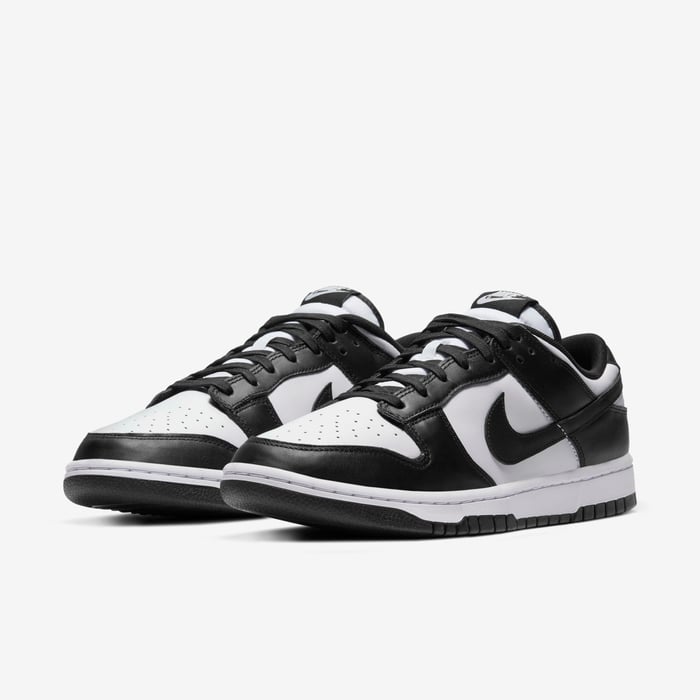 Nike Dunk Low Retro — White / Black — front three quarter pair