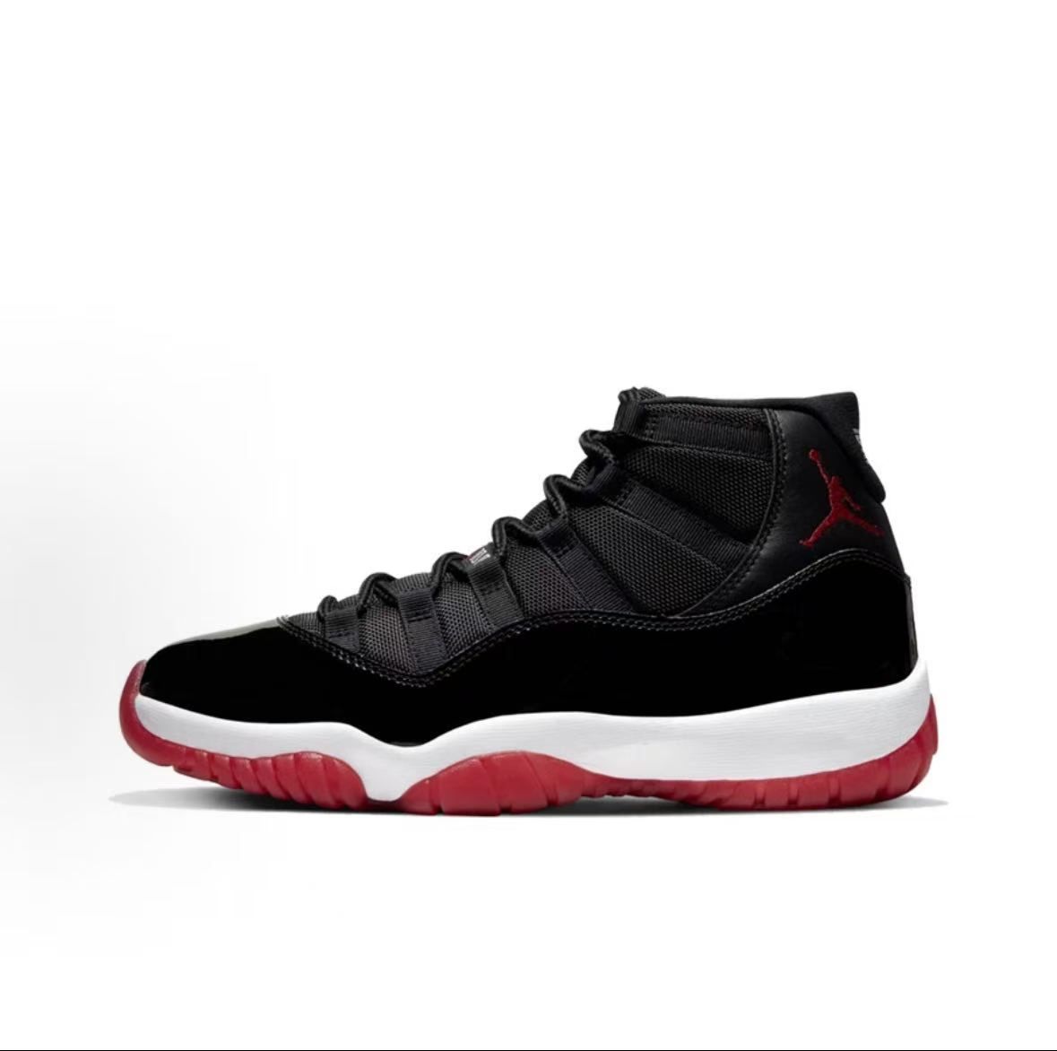 Jordan Air Jordan 11 Sneakers — Black / Red / White — source catalog lateral side