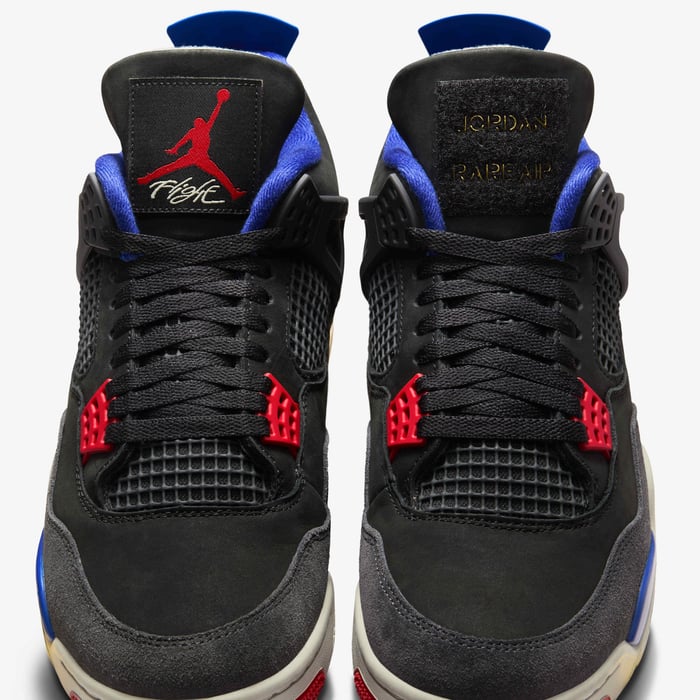 Air Jordan 4 Retro — Black / Deep Royal Blue / Fire Red — front pair tongue detail