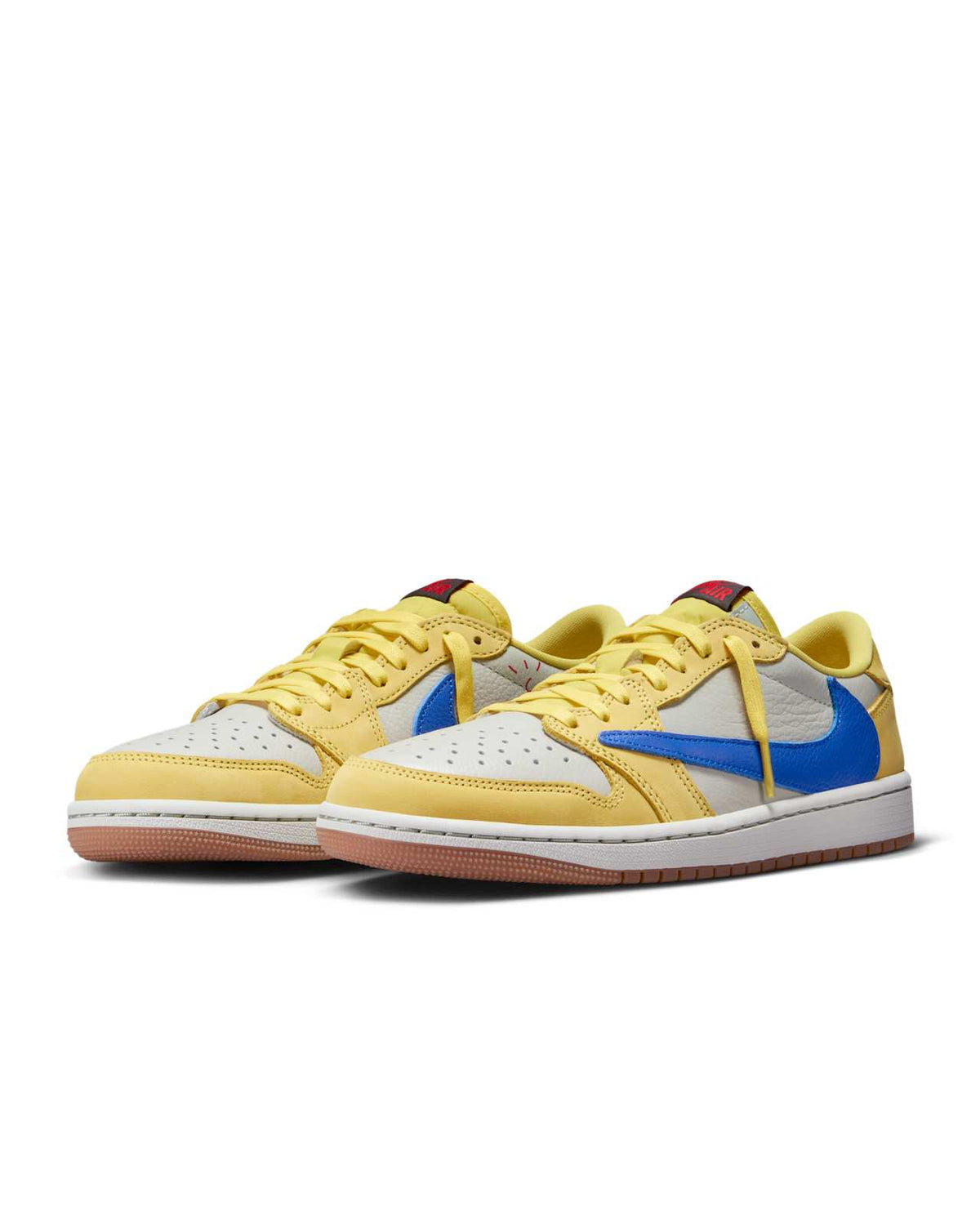 Air Jordan 1 Low OG x Travis Scott — Canary — front three quarter pair