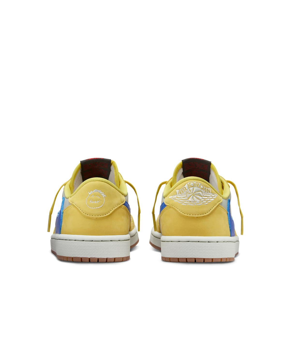 Air Jordan 1 Low OG x Travis Scott — Canary — rear pair