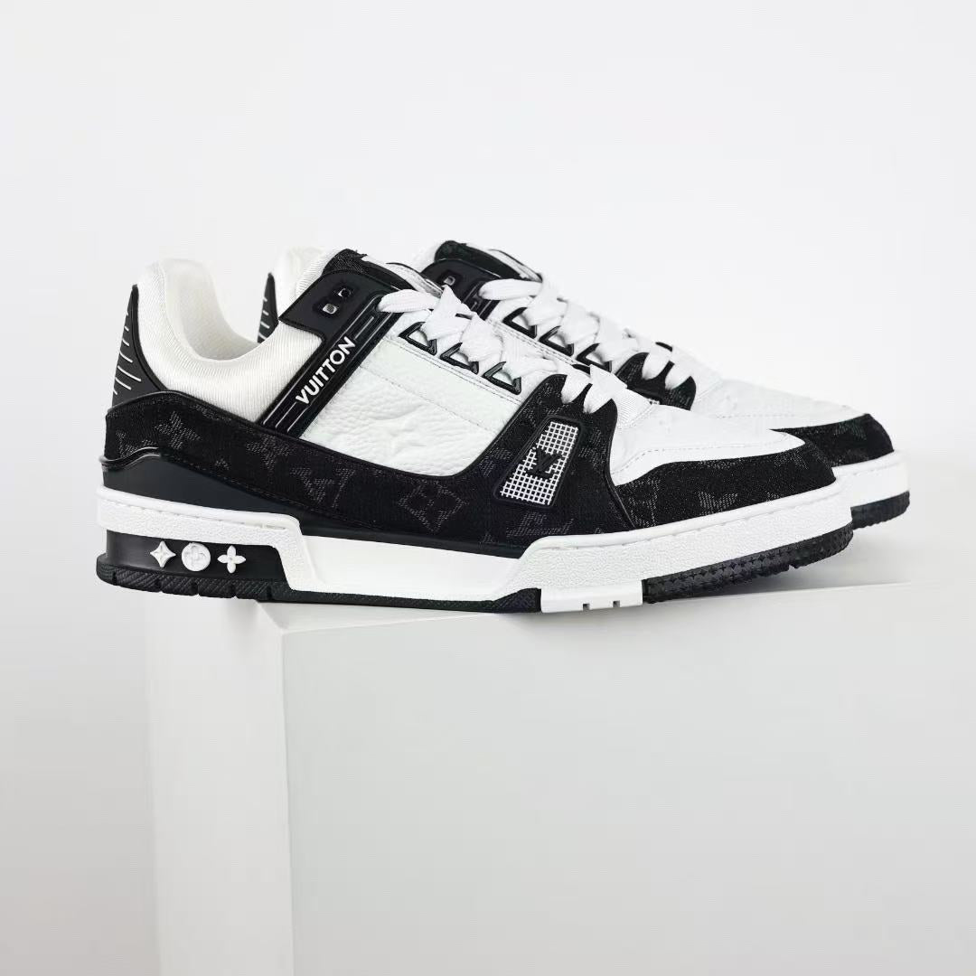 Louis Vuitton LV Trainer — Black / White — front three quarter pair