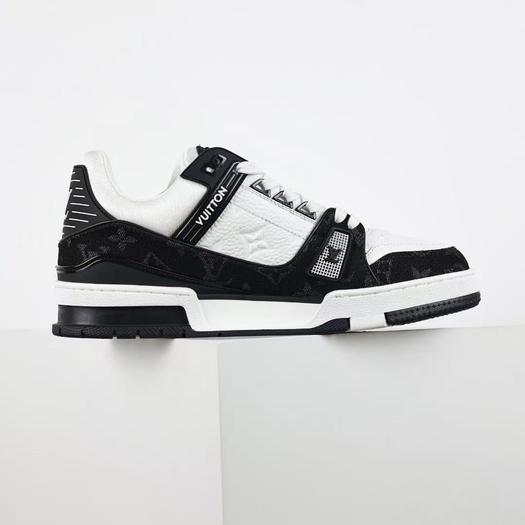 Louis Vuitton LV Trainer — Black / White — medial side