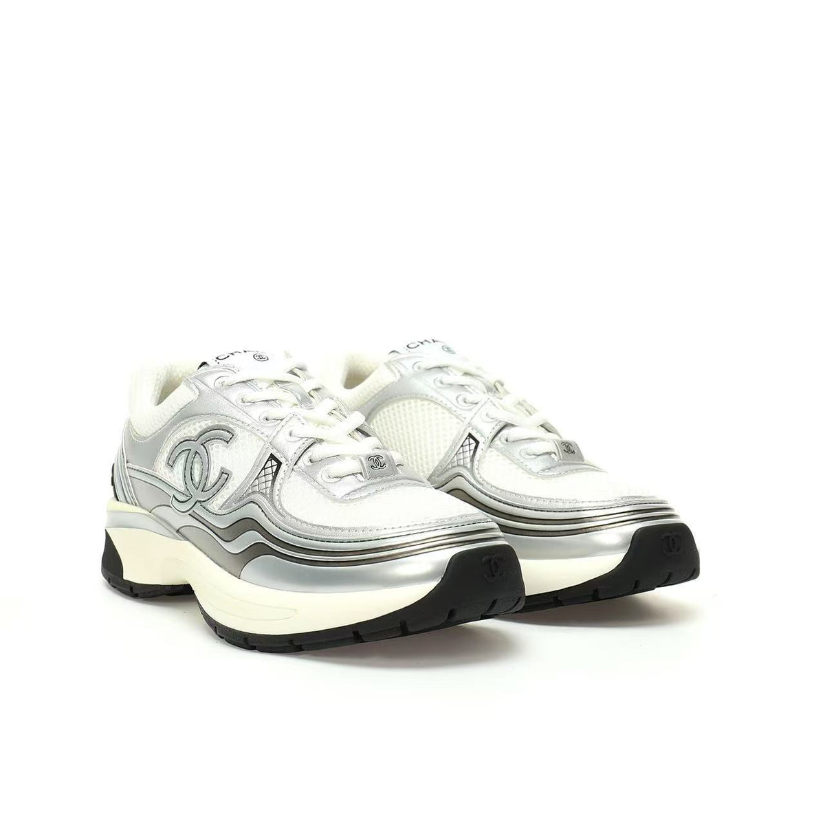 Chanel Sneakers — Silver / White / Black — front three quarter pair