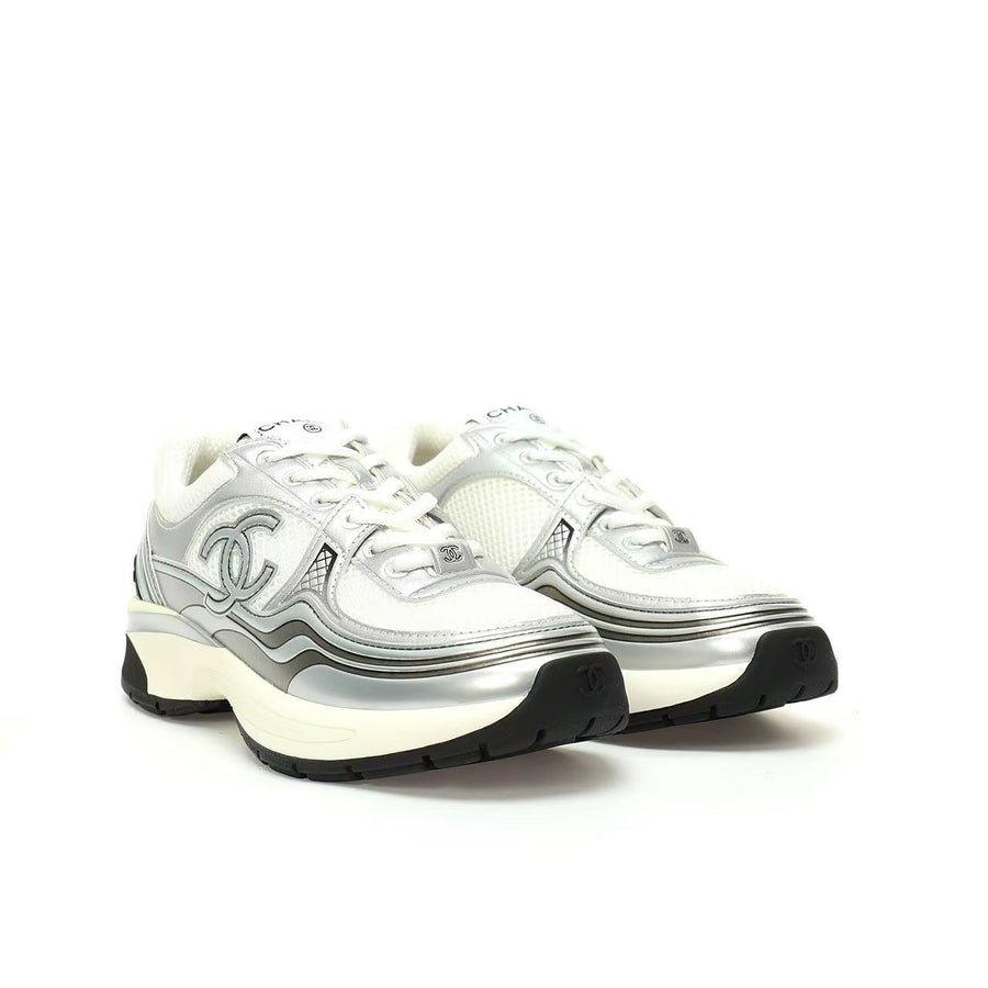 Chanel Sneakers — Silver / White / Black — front three quarter pair