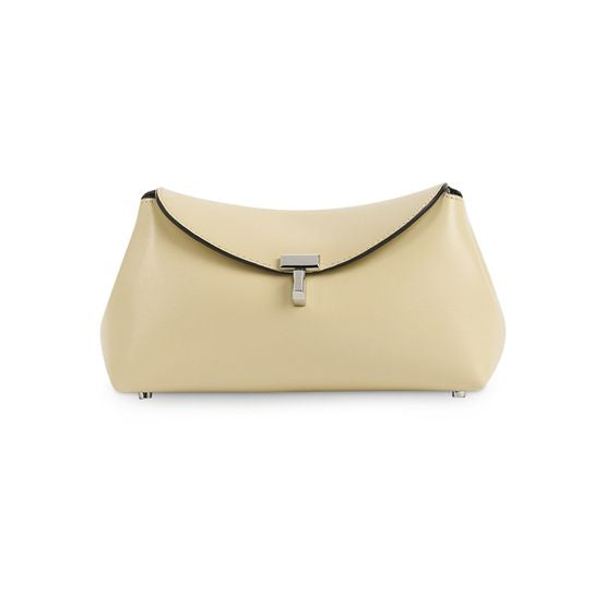 Toteme Mini T-Lock leather clutch bag — Champagne